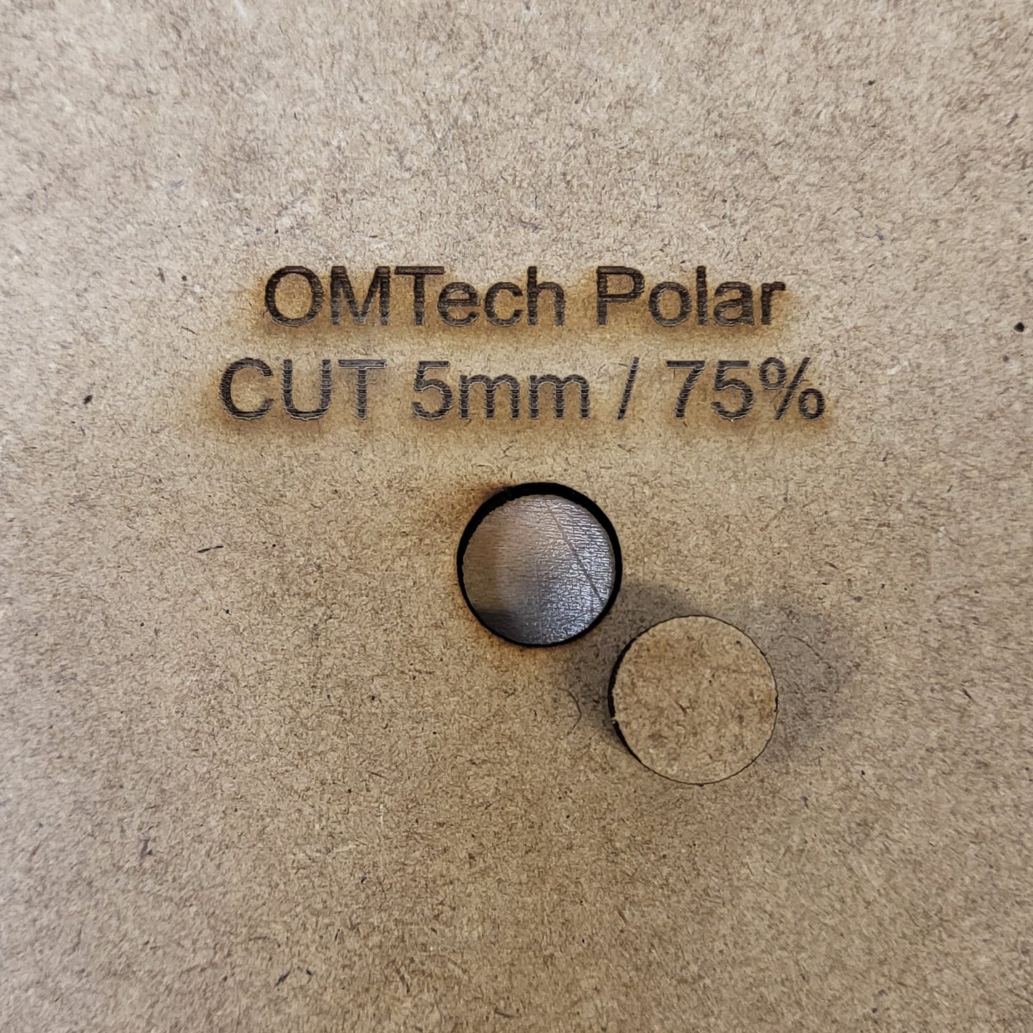 OMTech Polar cut sample on a MDF