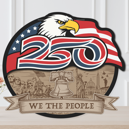 Decorative sign with eagle, American flag, and 'We the People' text on a white background