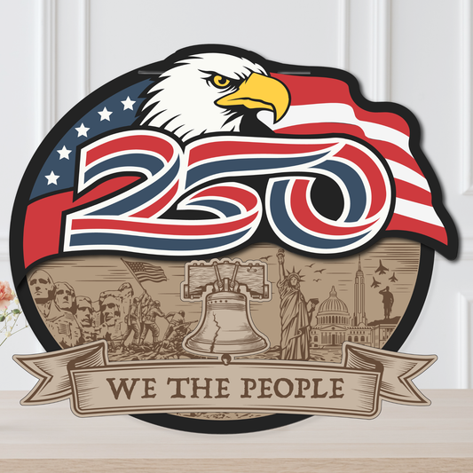 Decorative sign with eagle, American flag, and 'We the People' text on a white background