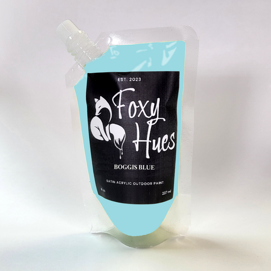 Foxy Hues paint pouch with blue and black design on a white background