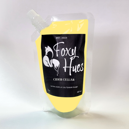 Paint pouch with 'Foxy Hues' branding on a white background