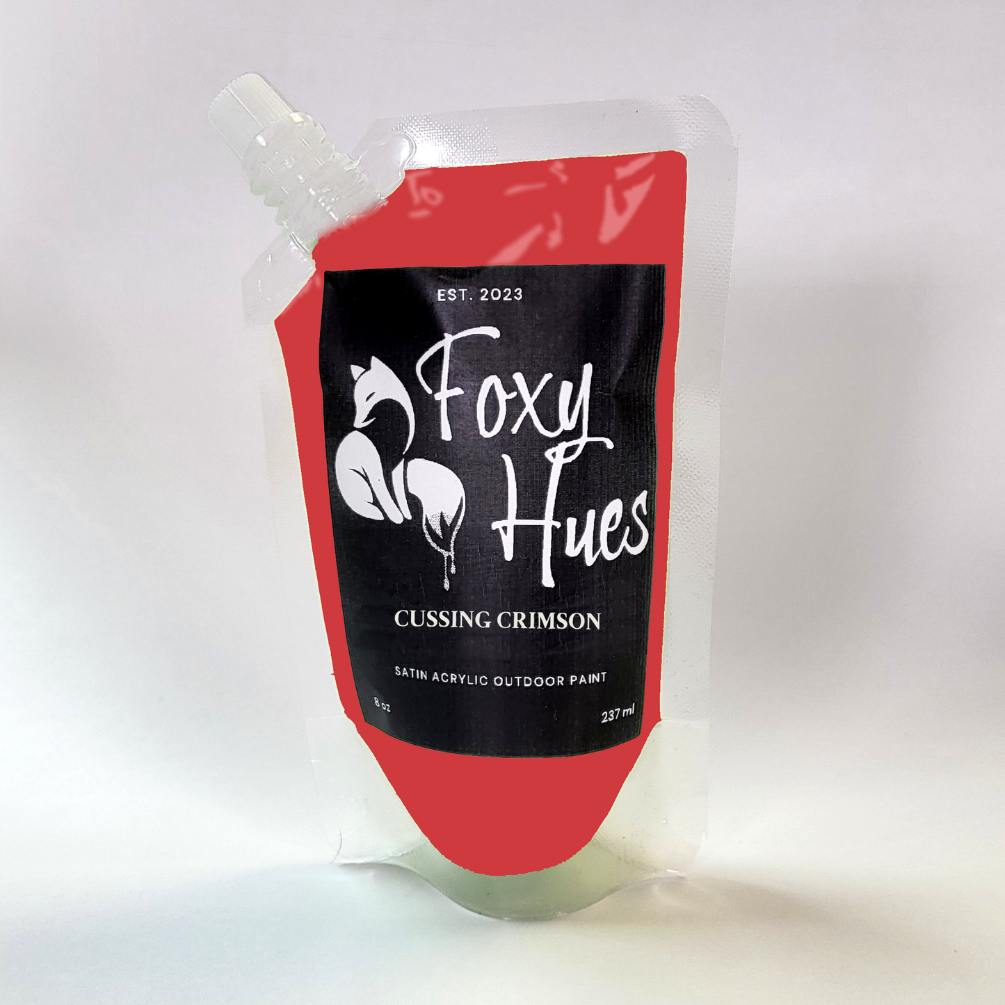 Foxy Hues paint pouch with red and black design on a white background