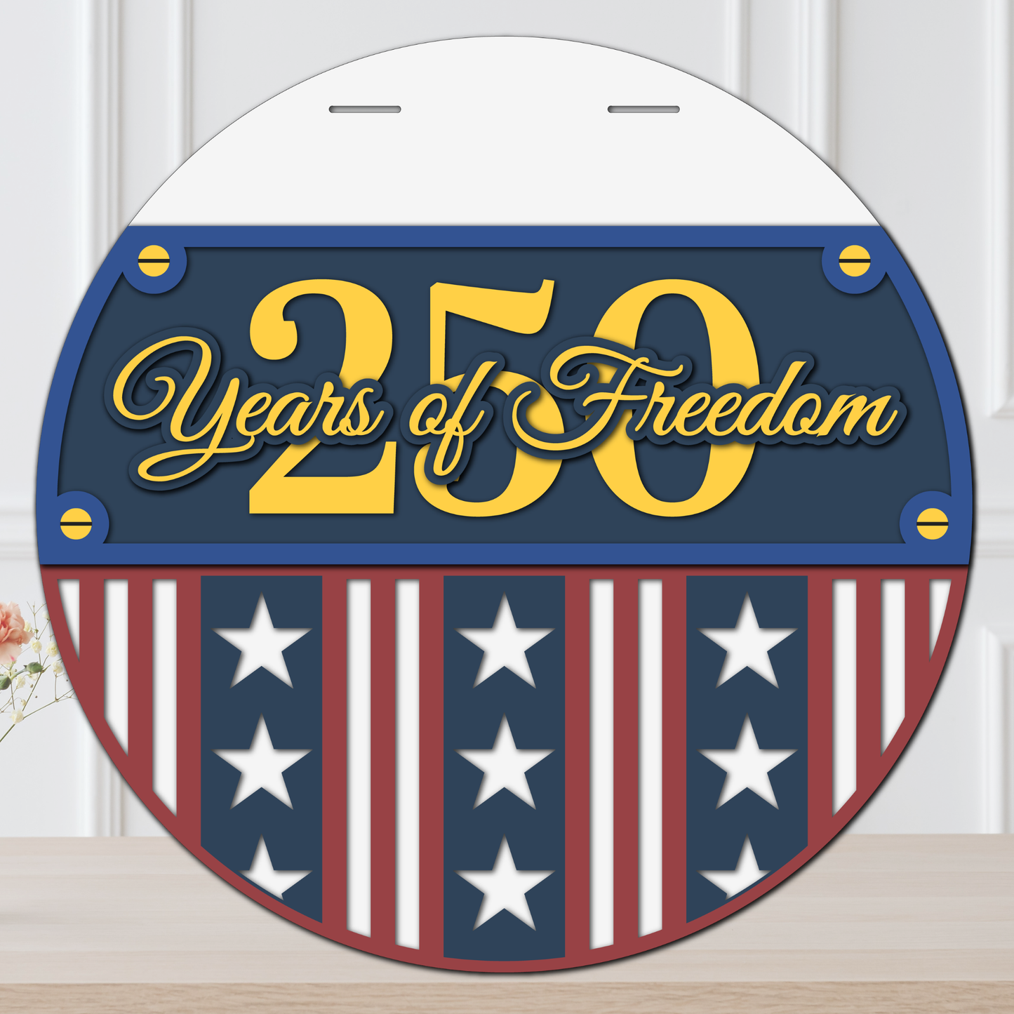 Decorative sign with '250 Years of Freedom' text and American flag design on a white background.