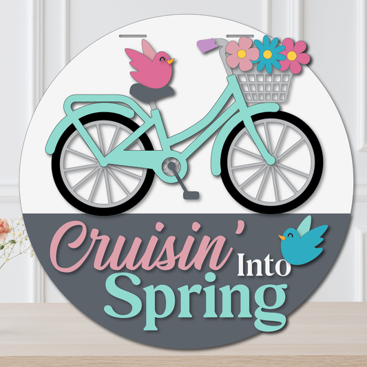 Decorative sign with a bicycle, flowers, and birds on a white background
