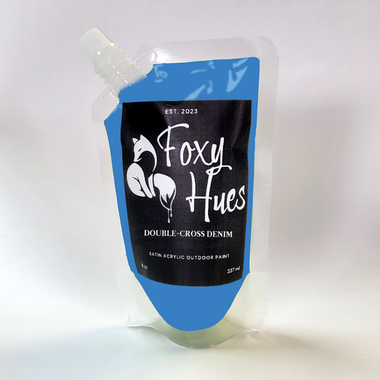 Foxy Hues paint pouch with blue top and black label on a white background