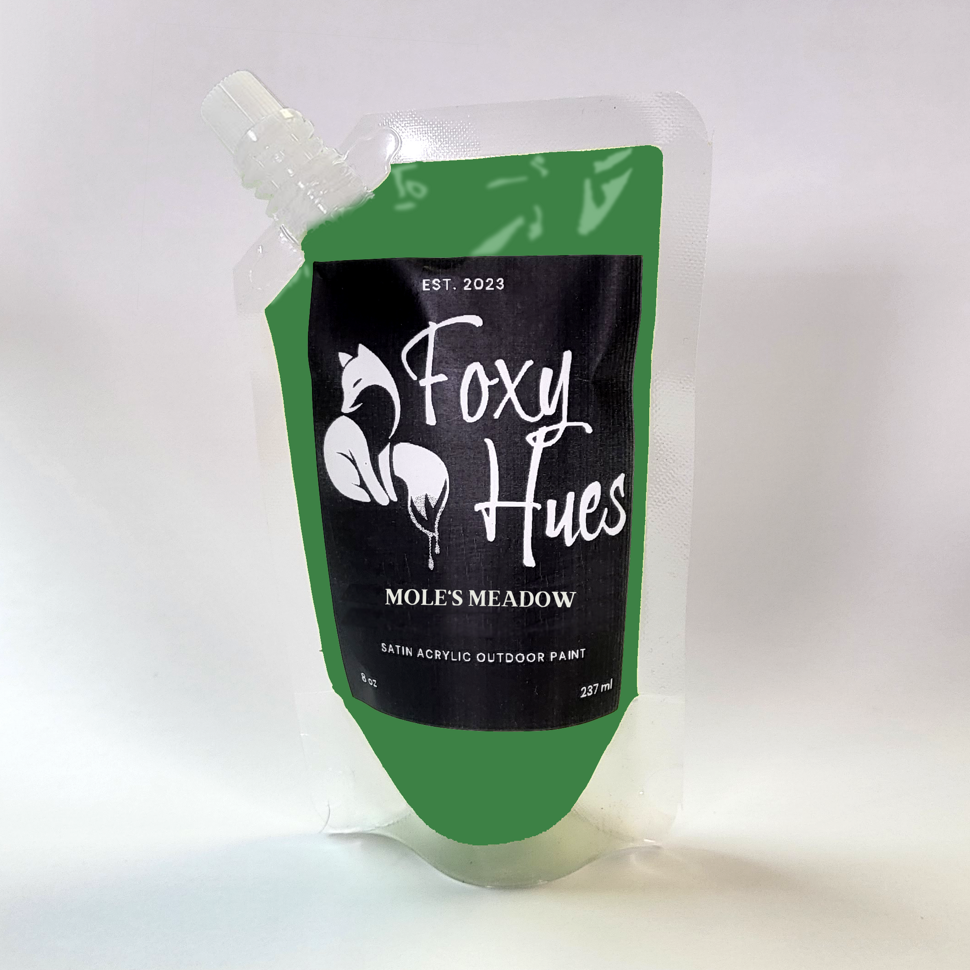 Green and black paint pouch with 'Foxy Hues' branding on a white background