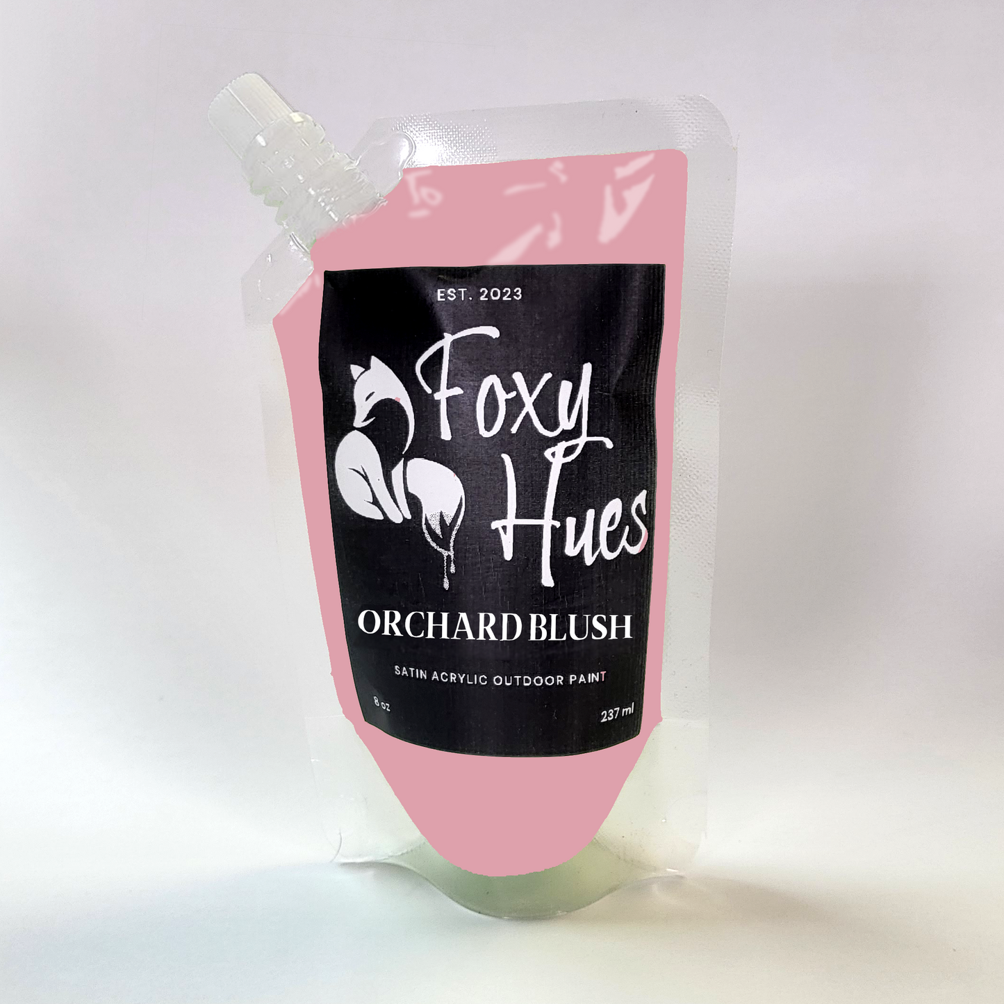 Pink paint pouch with 'Foxy Hues' branding on a white background