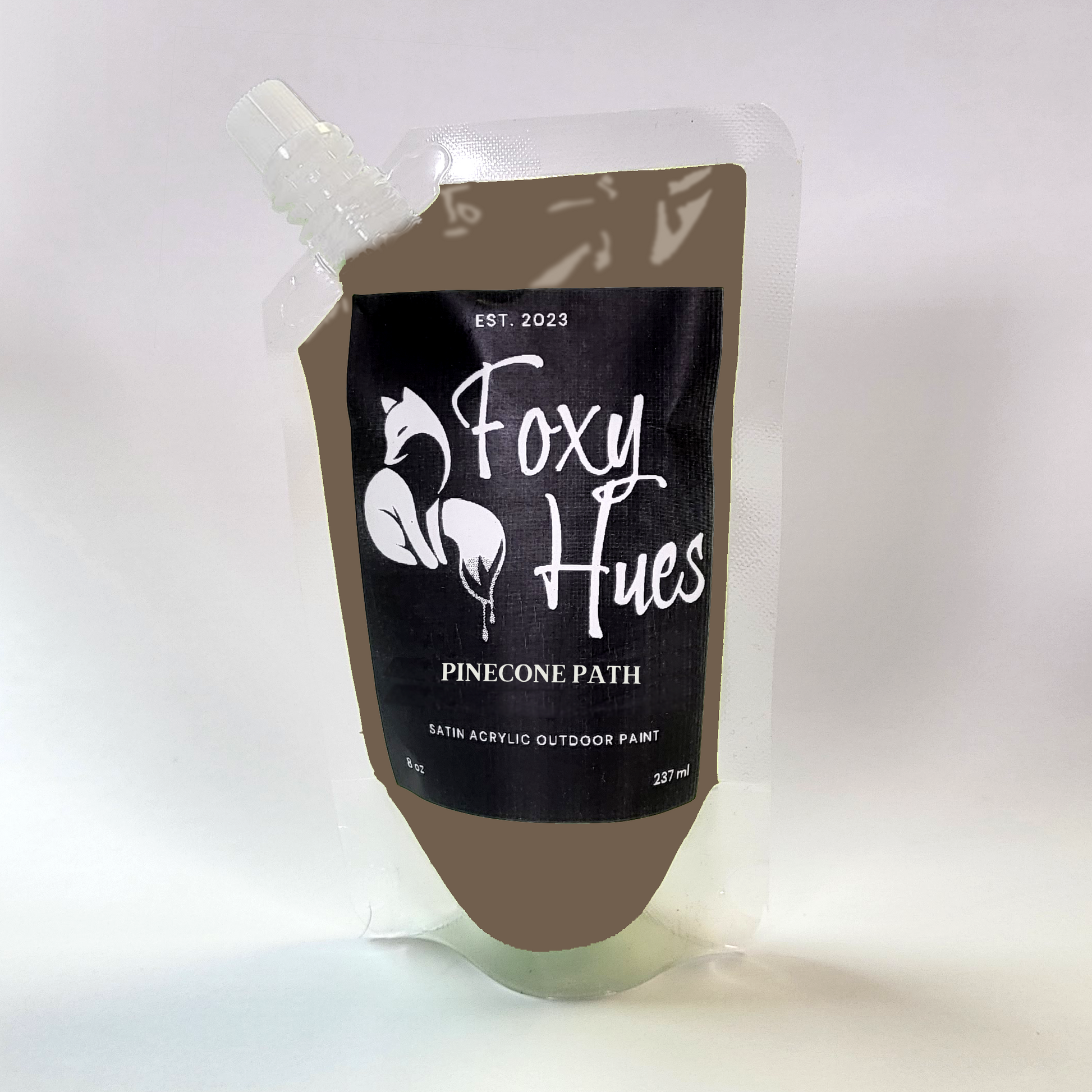 Paint container with 'Foxy Hues' branding on a white background
