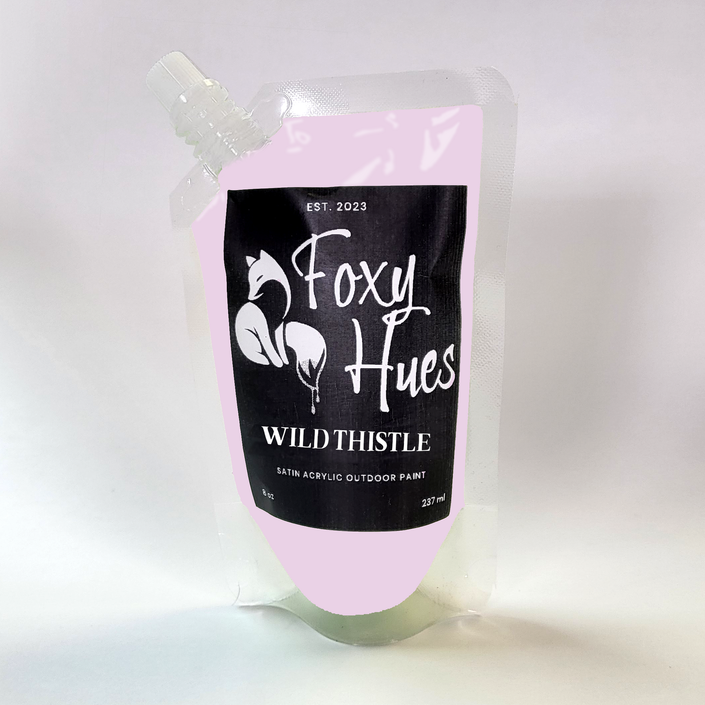 Paint container with 'Foxy Hues' label on a white background